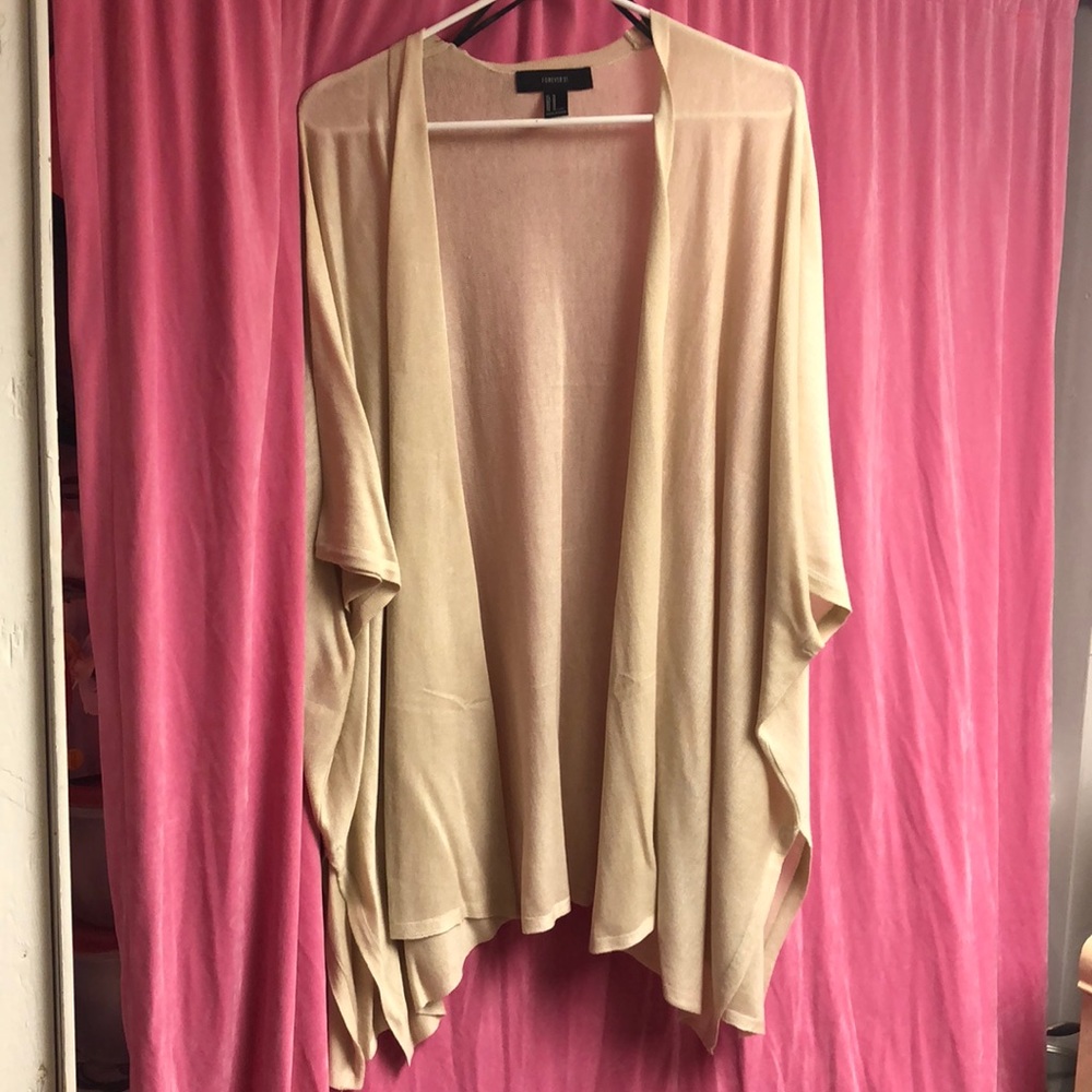 Beige cardigan.